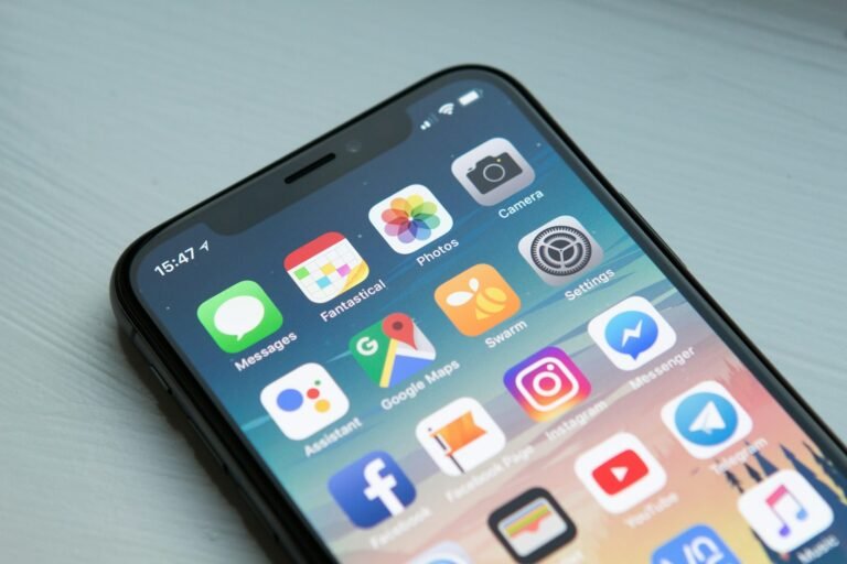 Smartphone showing maps and travel apps