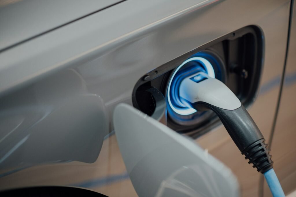 Electric car charging at a station