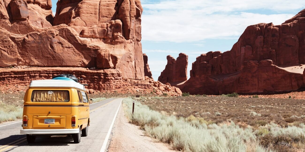 Open road through dramatic mountain scenery