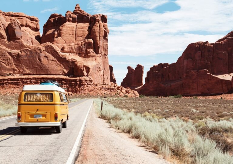 Open road through dramatic mountain scenery