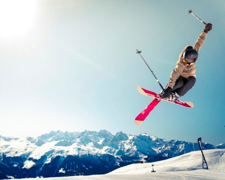 Skiers on a snowy European mountain slope